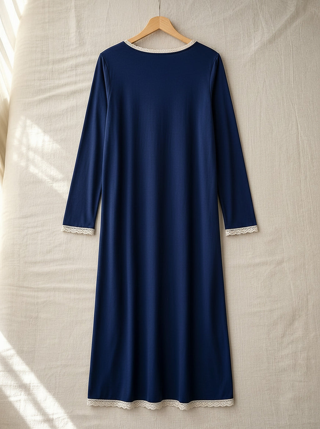Araminta soft long sleeve nightie, back view on a wooden hanger, Cedar Atelier