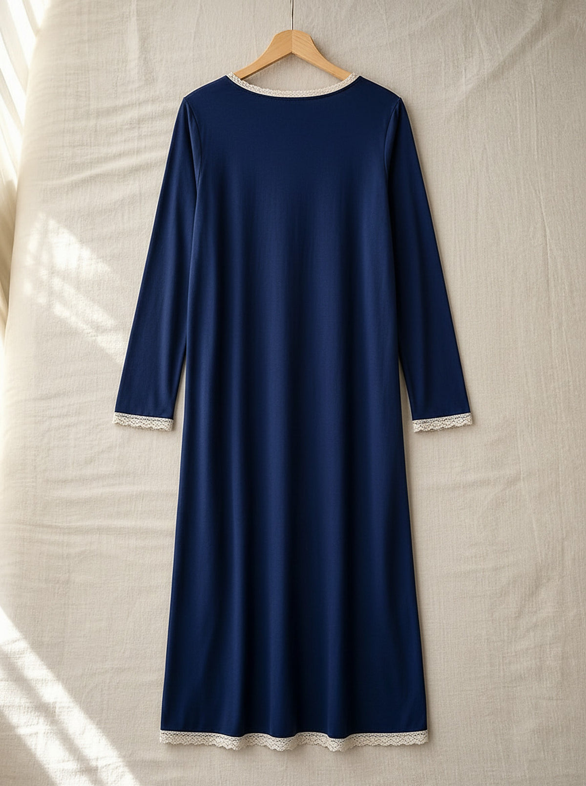 Araminta soft long sleeve nightie, back view on a wooden hanger, Cedar Atelier