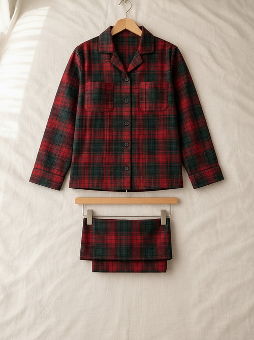 Beatrice soft flannel pyjamas, front view on a wooden hanger, Cedar Atelier