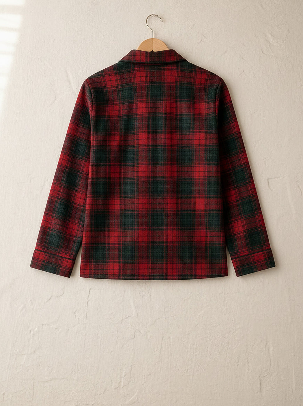Beatrice soft flannel pyjamas, back view on a wooden hanger, Cedar Atelier