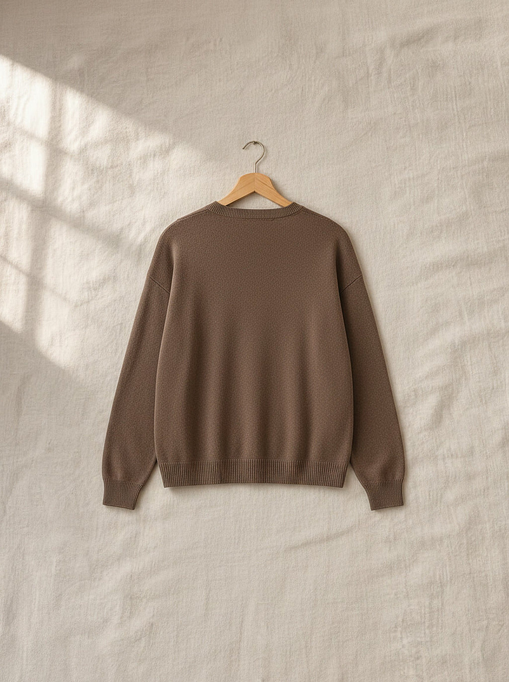 Margot soft knit lounge set, back view on a wooden hanger, Cedar Atelier