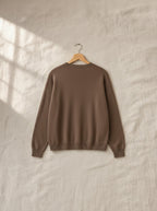 Margot soft knit lounge set, back view on a wooden hanger, Cedar Atelier